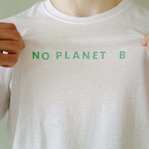 White t-shirt with 'No Planet B' slogan promoting environmental awareness.